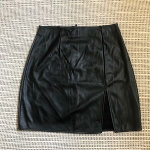 Black vegan leather faux pleather mini skirt with slit